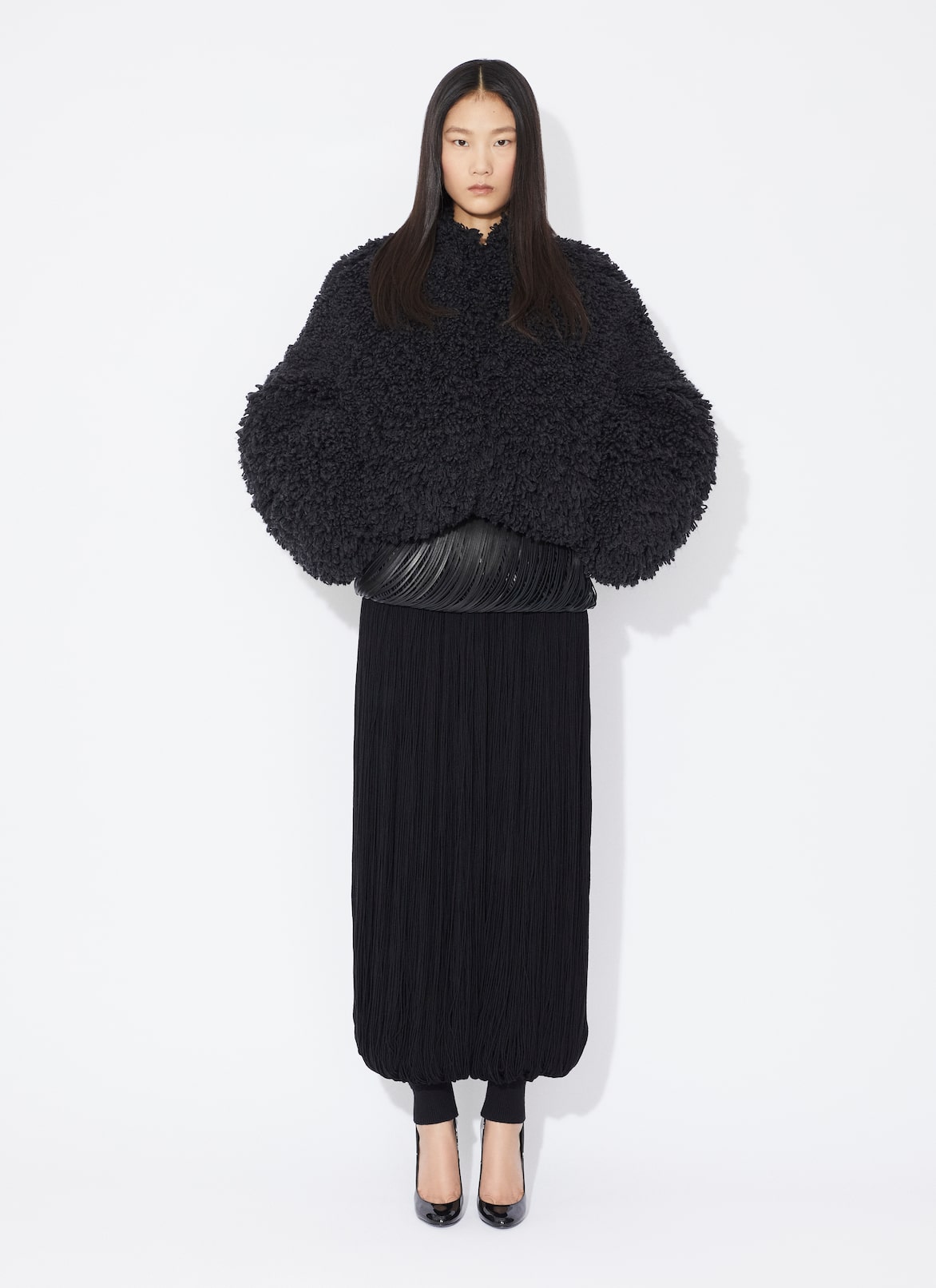 KNITTED FRINGE ROUND PANTS ALAÏA BLACK KNITTED FRINGE ROUND PANTS